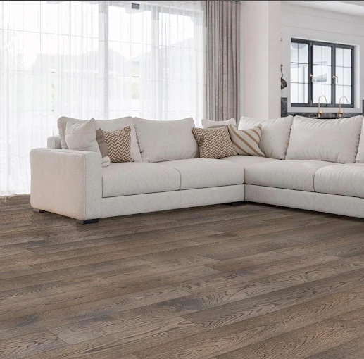 Wood-look plank flooring in a living room with a white sofa