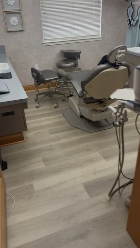 Grey wood-look flooring in a barber room