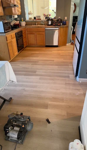 Uploaded kitchen project showing a wood floor being sanded